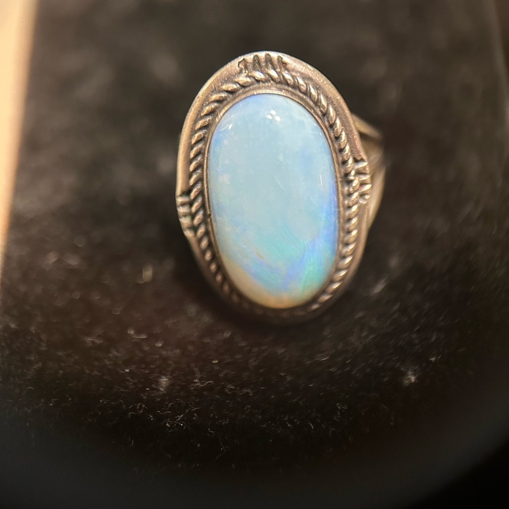 Silver ring with bluish stone
